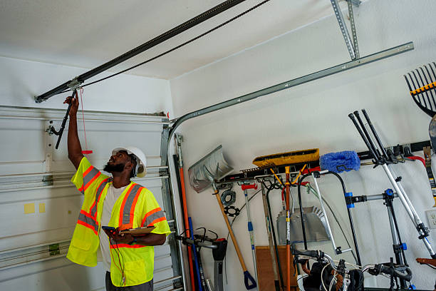 Professional Garage Door Installation technician working in Carson, WA